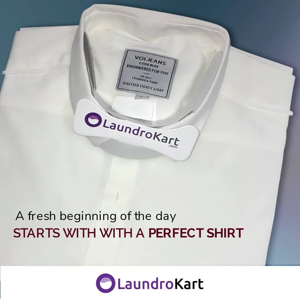 A white shirt finished and packed with the LaundroKart collar tag